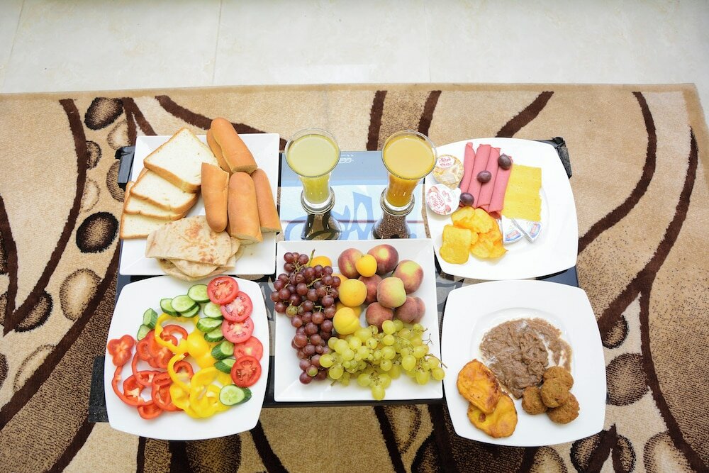 Фото Victory Of Downtown Hotel