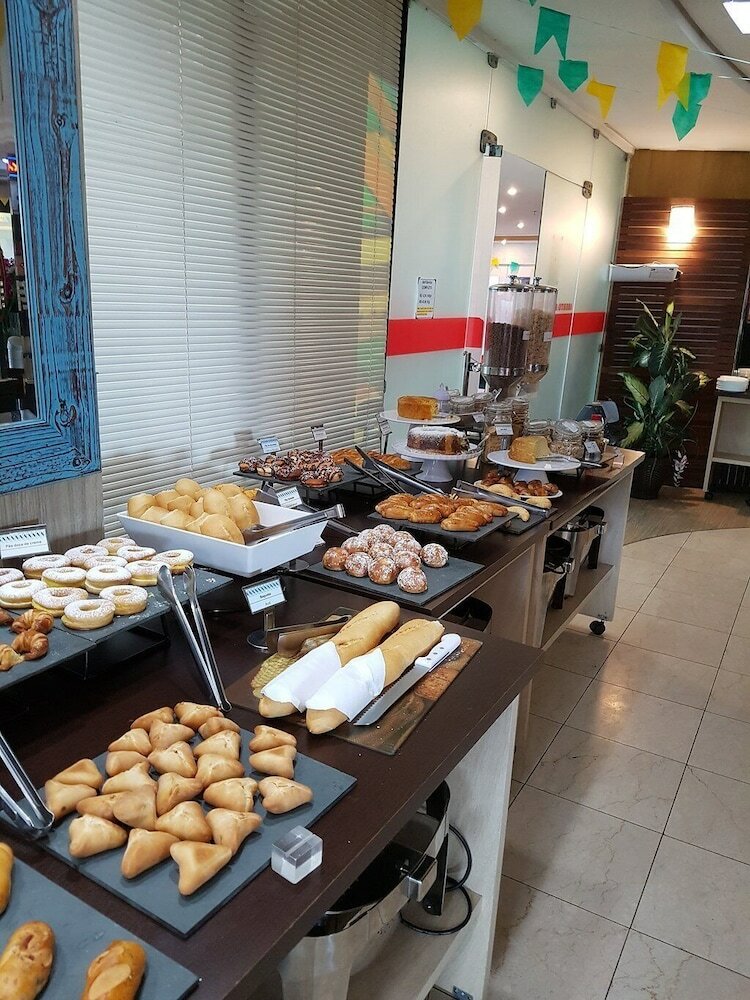 Фото Completo em Hotel Localização Perfeita