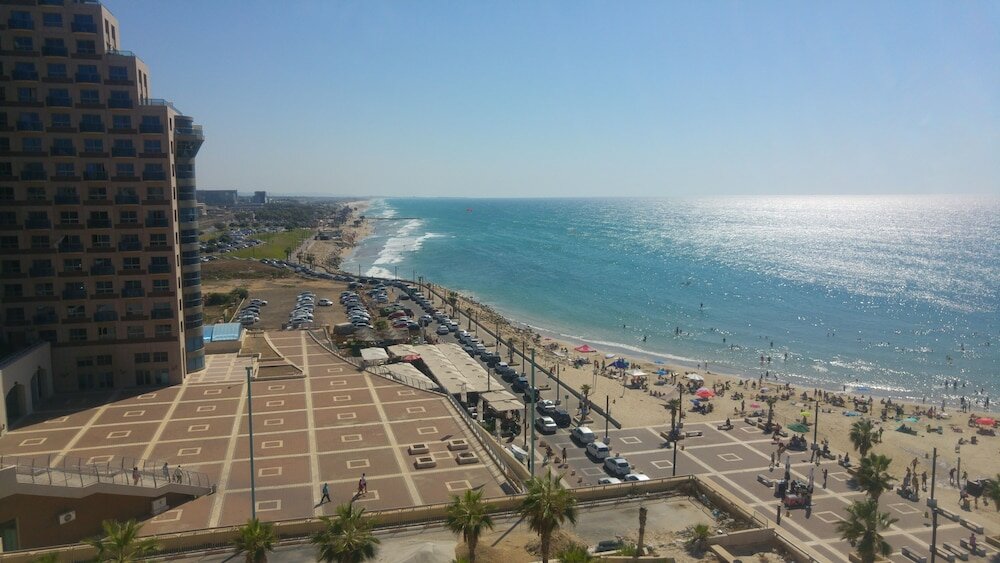 Фото Hof Hacarmel Apartments