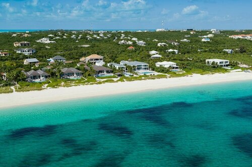 Гостиница Grace Bay Club на Тёрксе и Кайкосе