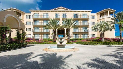 Апартаменты The Somerset on Grace Bay на Тёрксе и Кайкосе