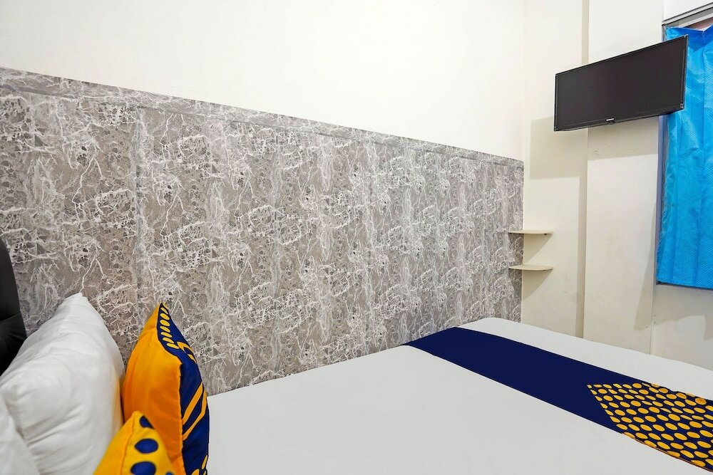 Фото Spot On 91360 Swk 68 Syariah