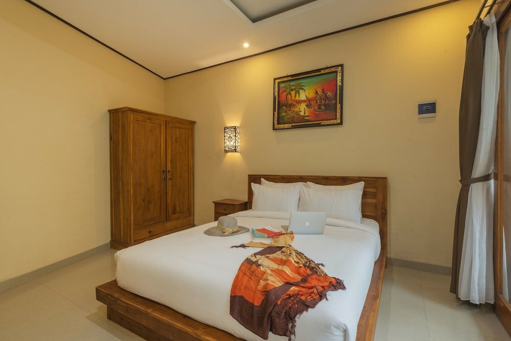 Фото Liliy Guest House Legian
