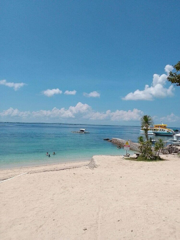 Фото Mactan Beach front Suites