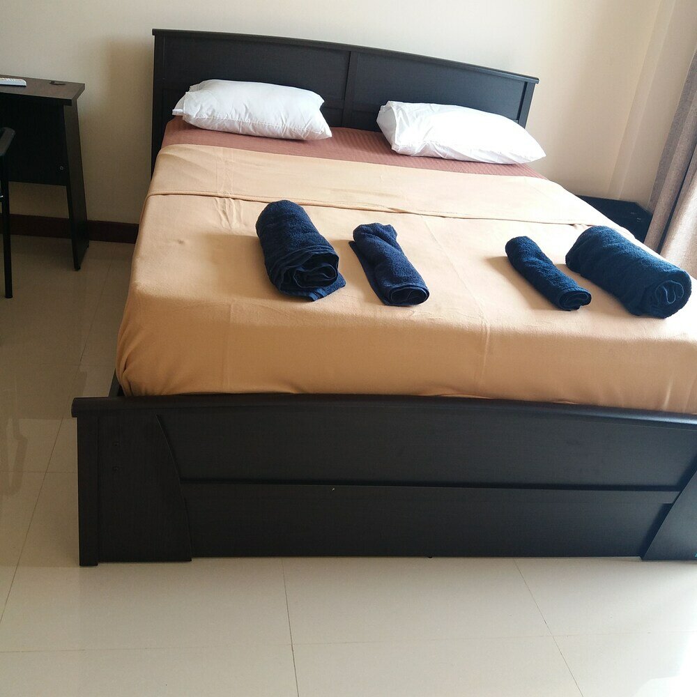 Фото Tj's Apartments