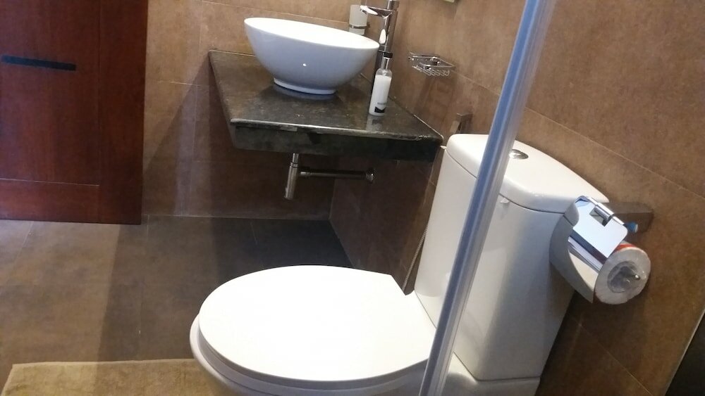 Фото Tj's Apartments