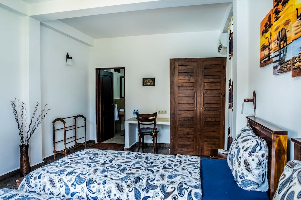 Фото Green Parrot Beach Resort