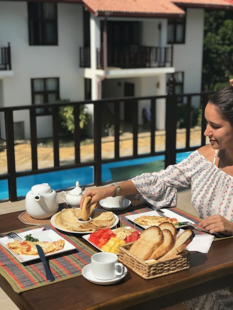 Фото Green Parrot Beach Resort