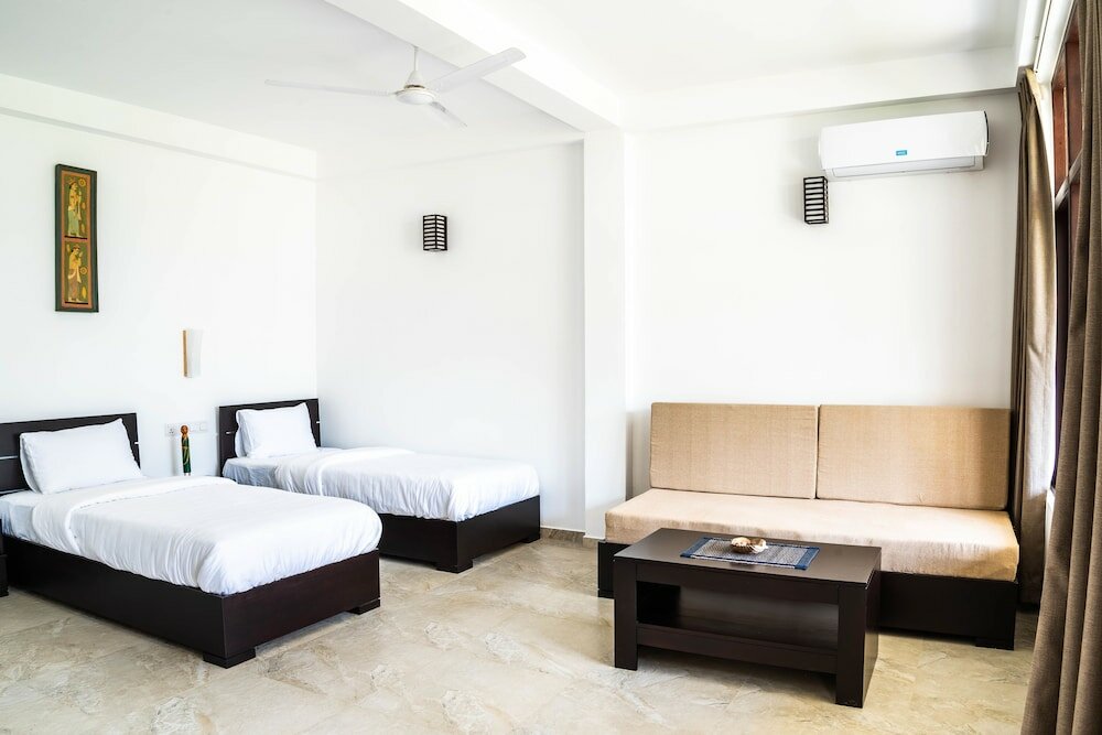 Фото Green Parrot Beach Resort