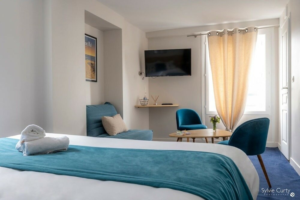 Фото Un Hôtel sur le Port