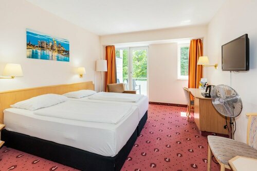 Гостиница Parkhotel Frankfurt Airport