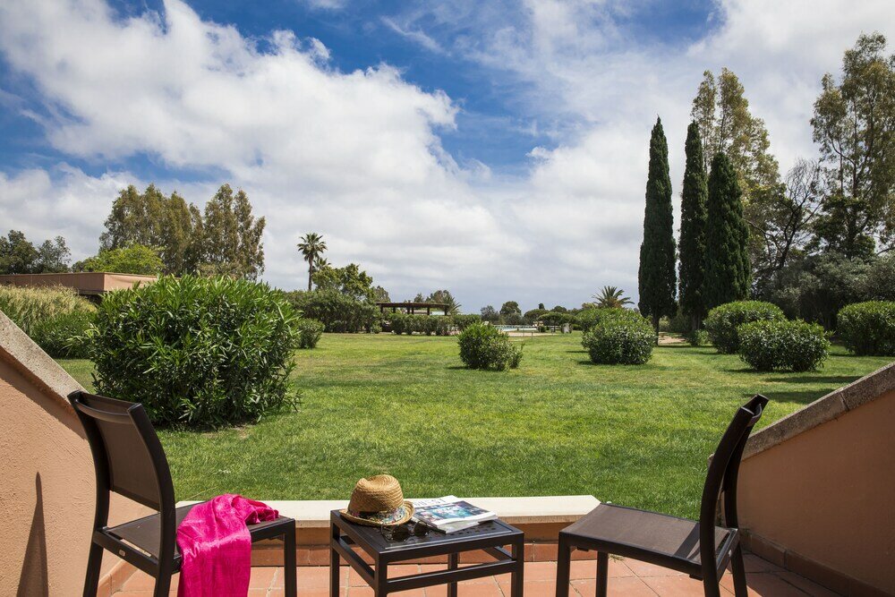 Фото Курортный отель Is Molas Resort