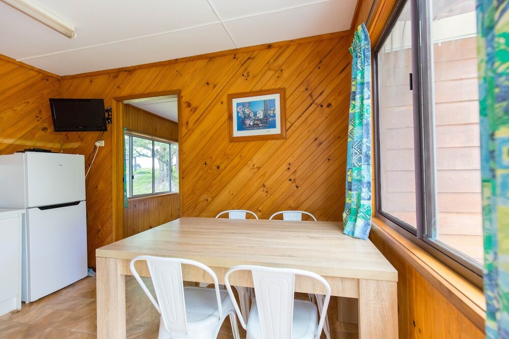 Фото Wonboyn Cabins & Caravan Park