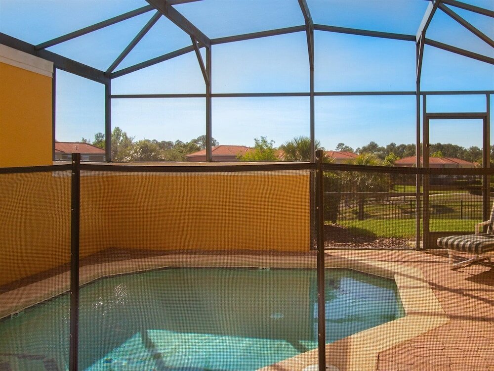Фото Private Screened Splash Pool Overlooking Tranquil Lake Right Beside Disney World by Florida Dream Homes
