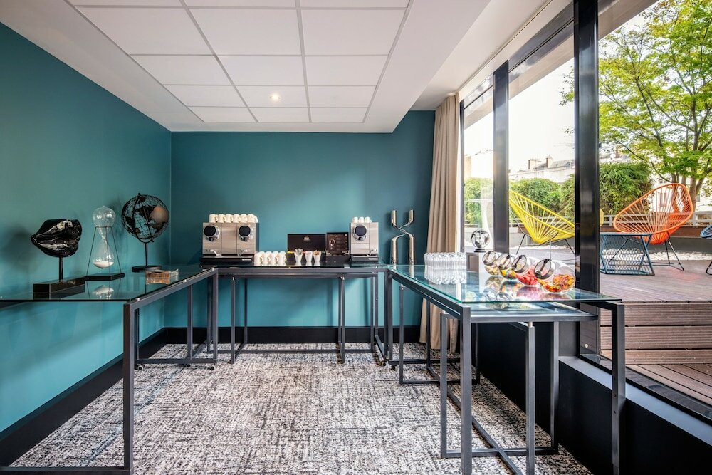 Фото Renaissance Paris Arc de Triomphe Hôtel