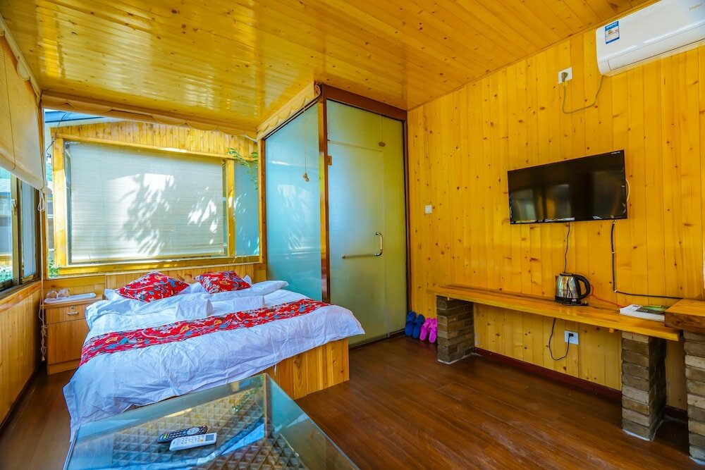 Фото Yijie Holiday Hotel Water GreatWall No. 2