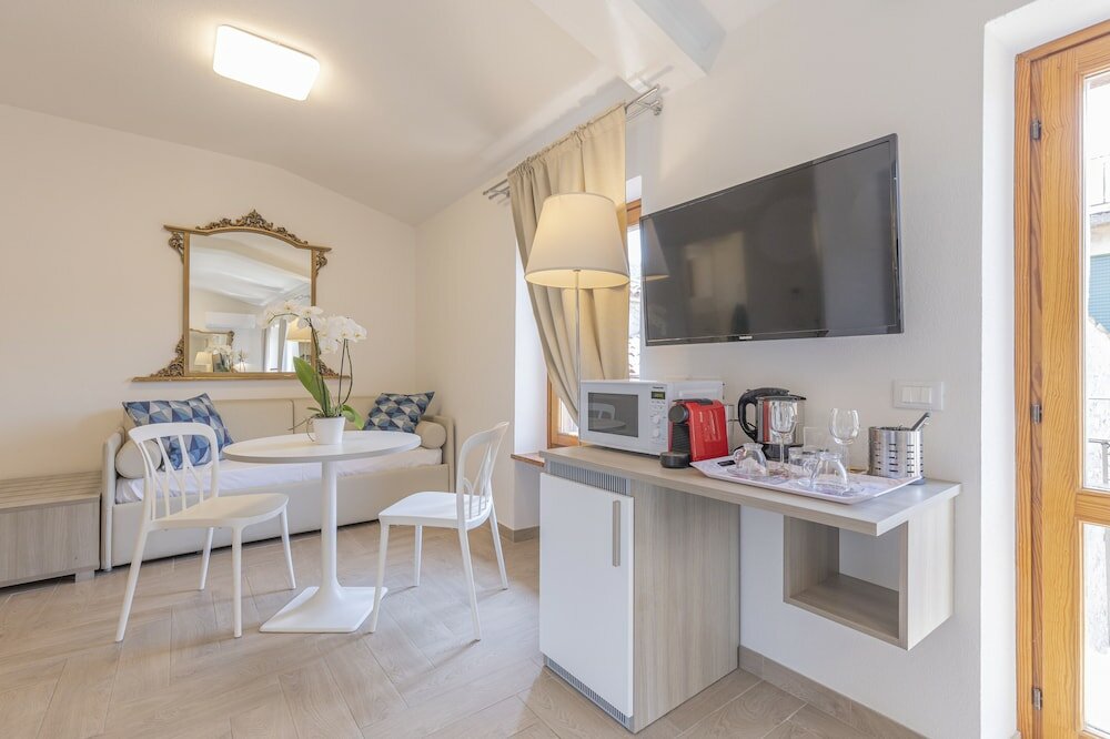 Фото Corte Realdi Boutique Rooms Garda