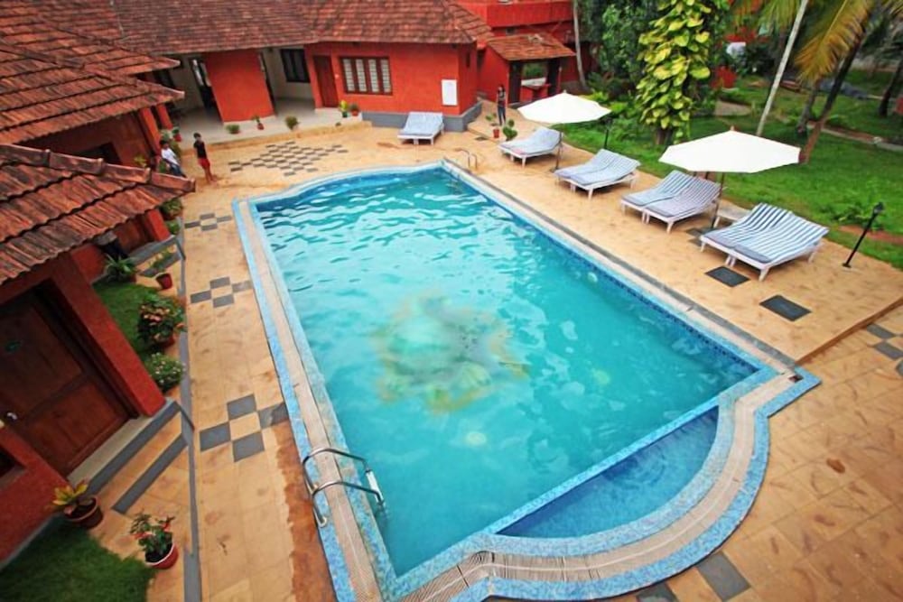 Фото Deshadan Cliff and Beach Resort