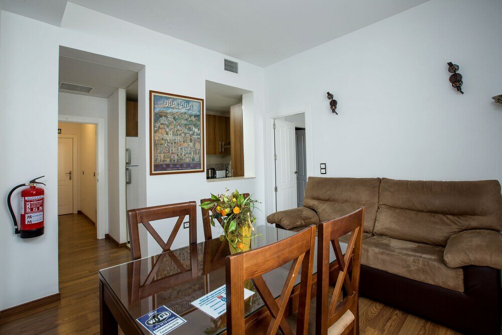 Фото Apartamentos Lonja del Marques