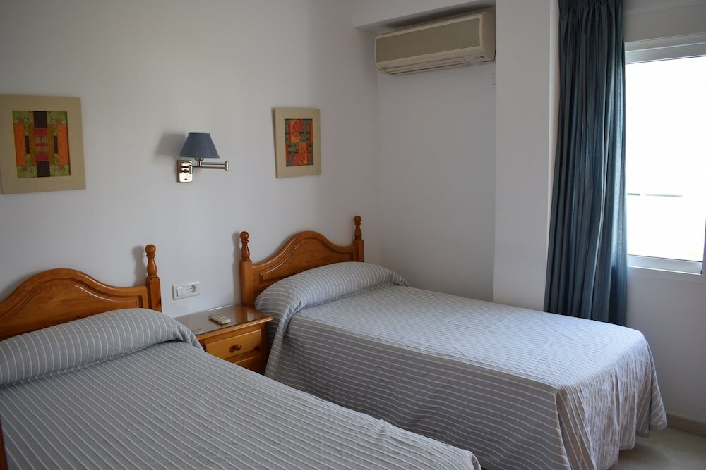 Фото Apartamentos El Jardin