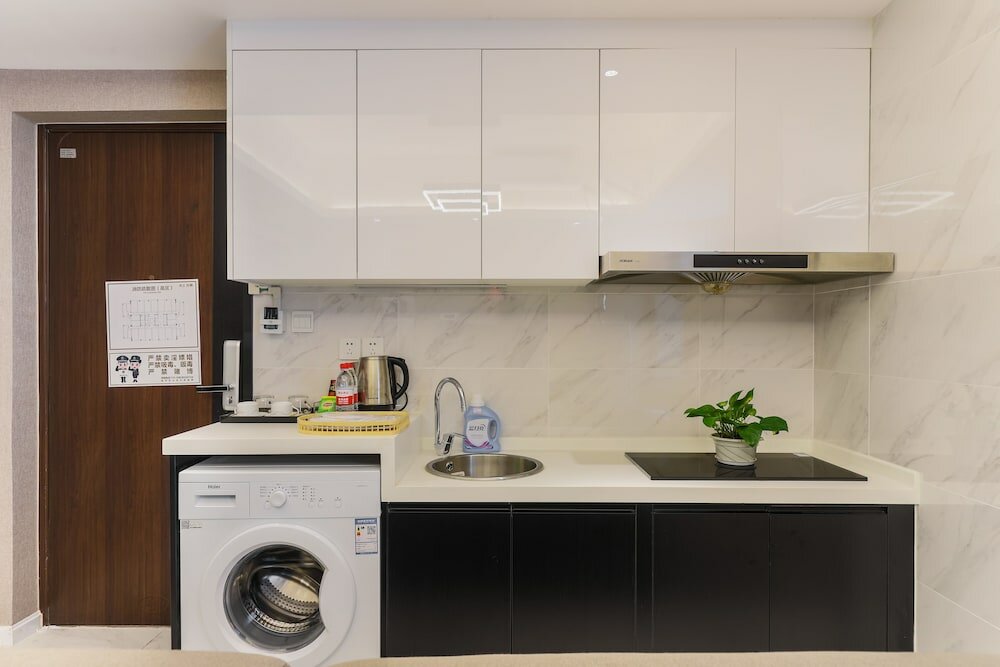 Фото Yue Qi Hotel Apartment