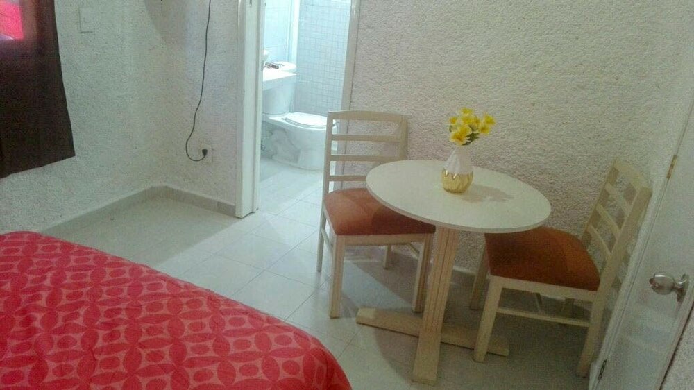 Фото Pok-Ta-Pok Guest House