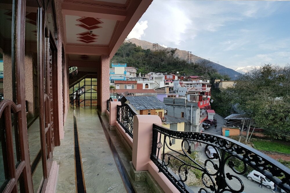 Фото Oyo 30576 Satyam Regency