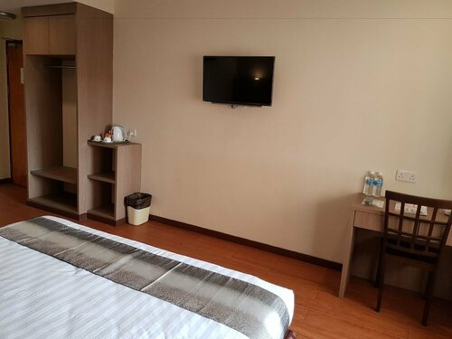 Гостиница Check Inn Hotel Tawau в Тавау