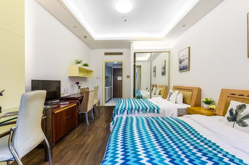 Фото Shanghai Yueyi Apartment Hotel