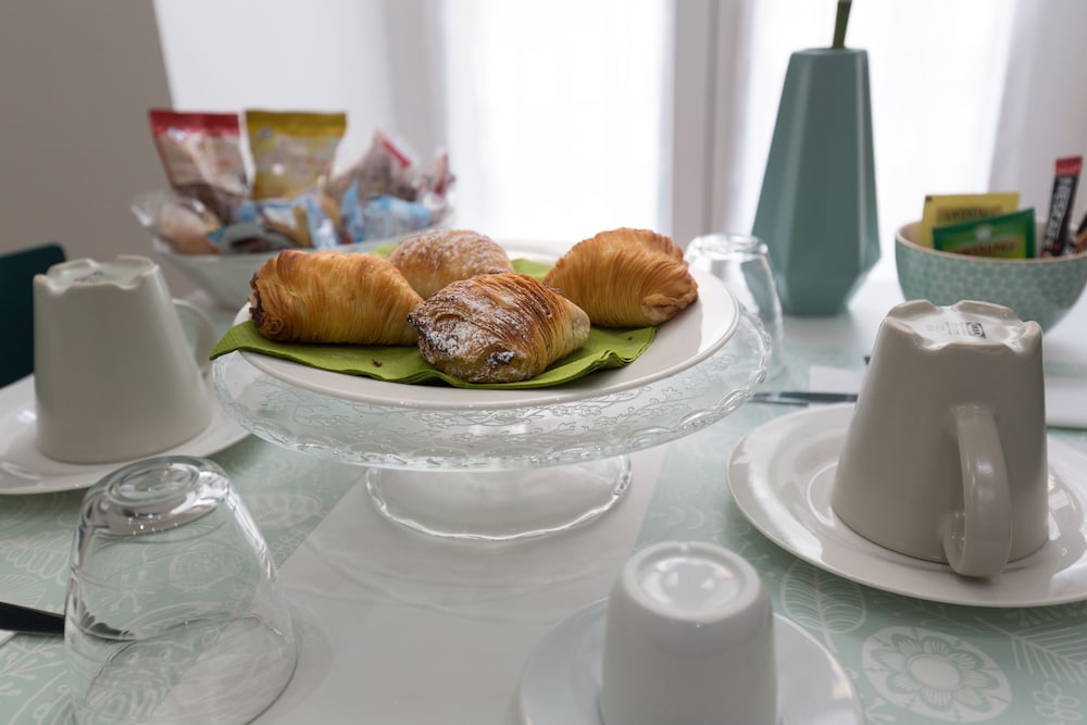 Фото Musto Suites & Rooms