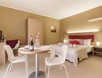 Фото Travini Hotel Residence