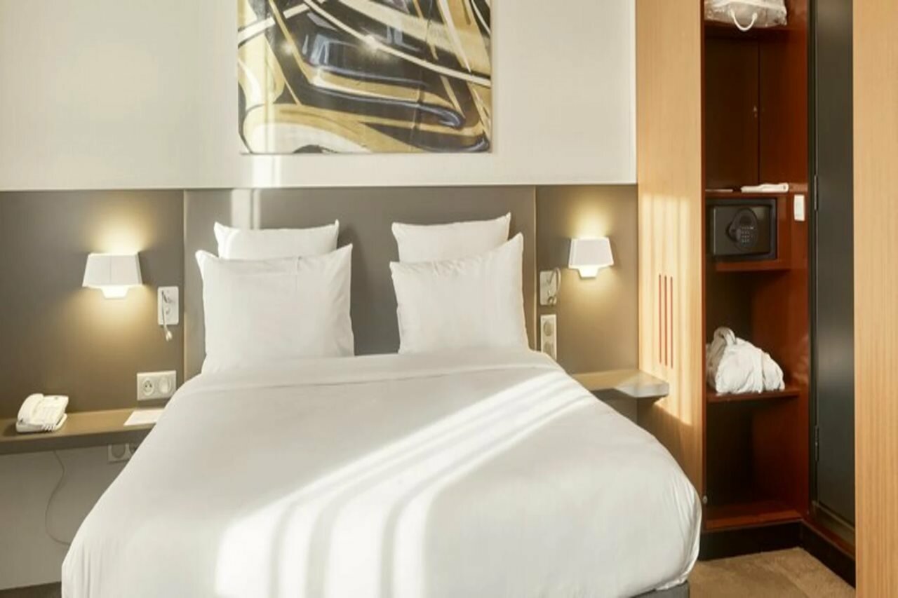 Фото Novotel Suites Paris Nord 18ème Hotel