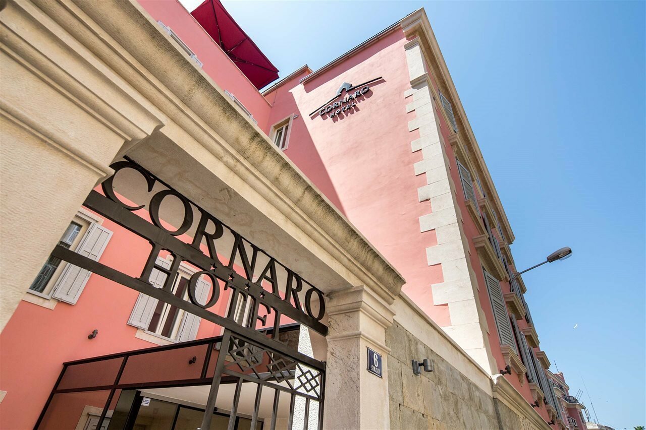Фото Cornaro Hotel