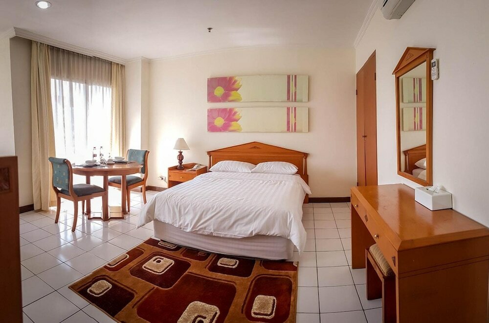 Фото Griya Prapanca Apartment