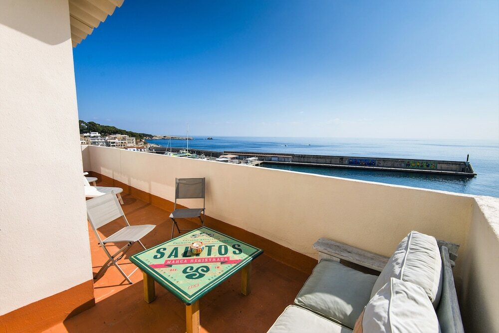 Фото Hostal Port Corona