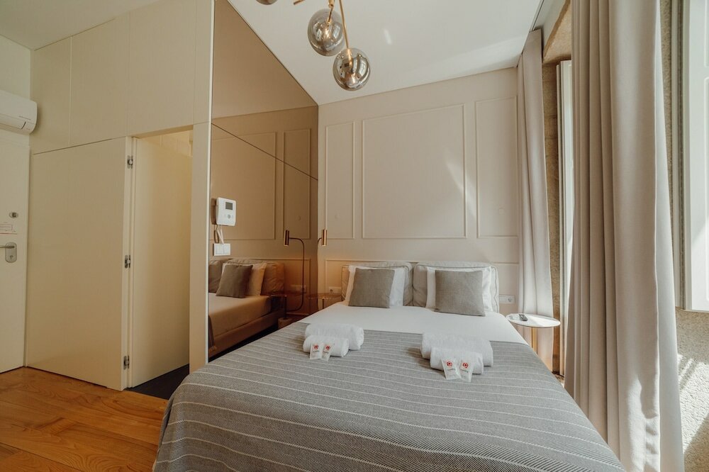 Фото Clérigos Boutique Apartment A by Homing