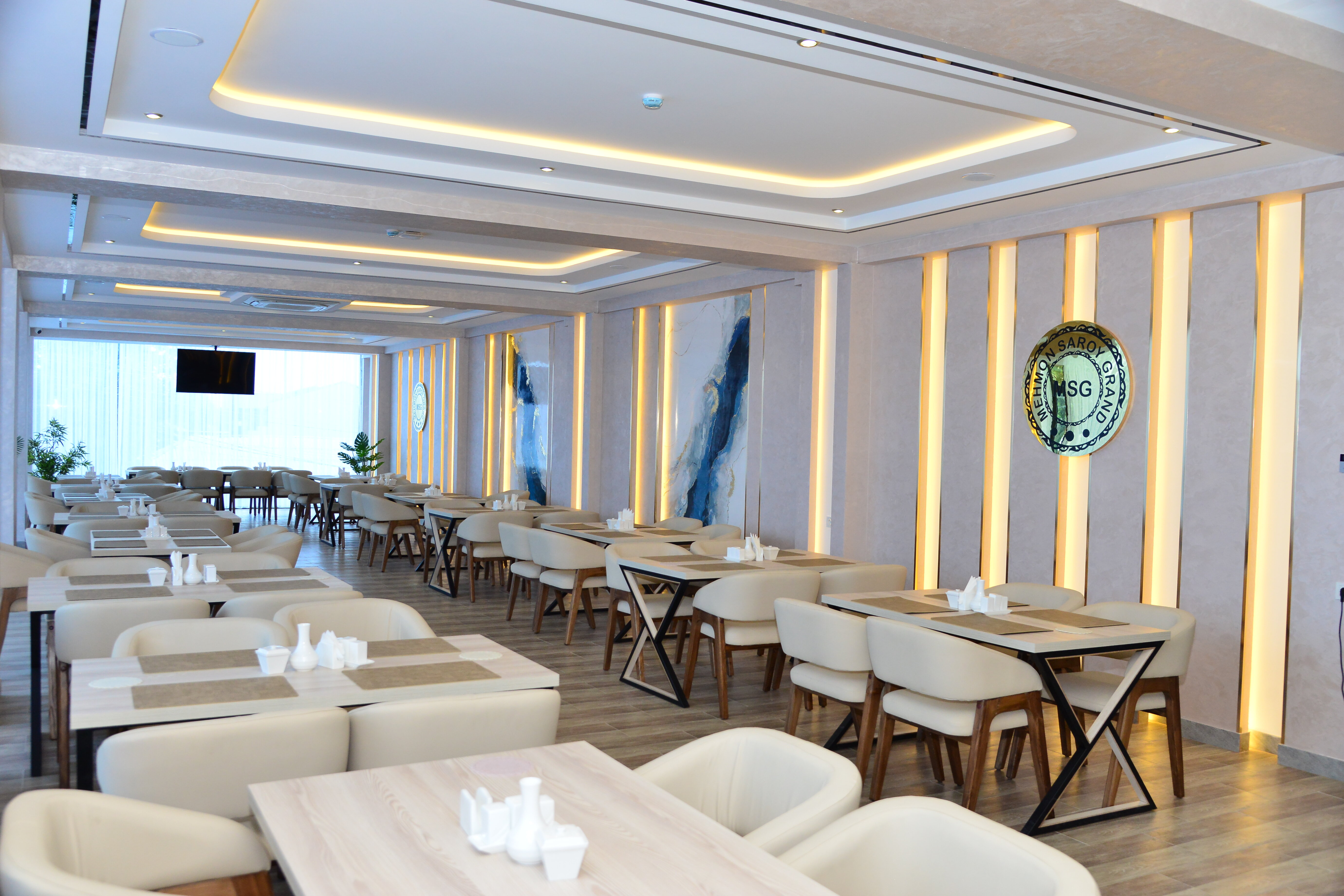 Фото Mehmonsaroy Grand Hotel