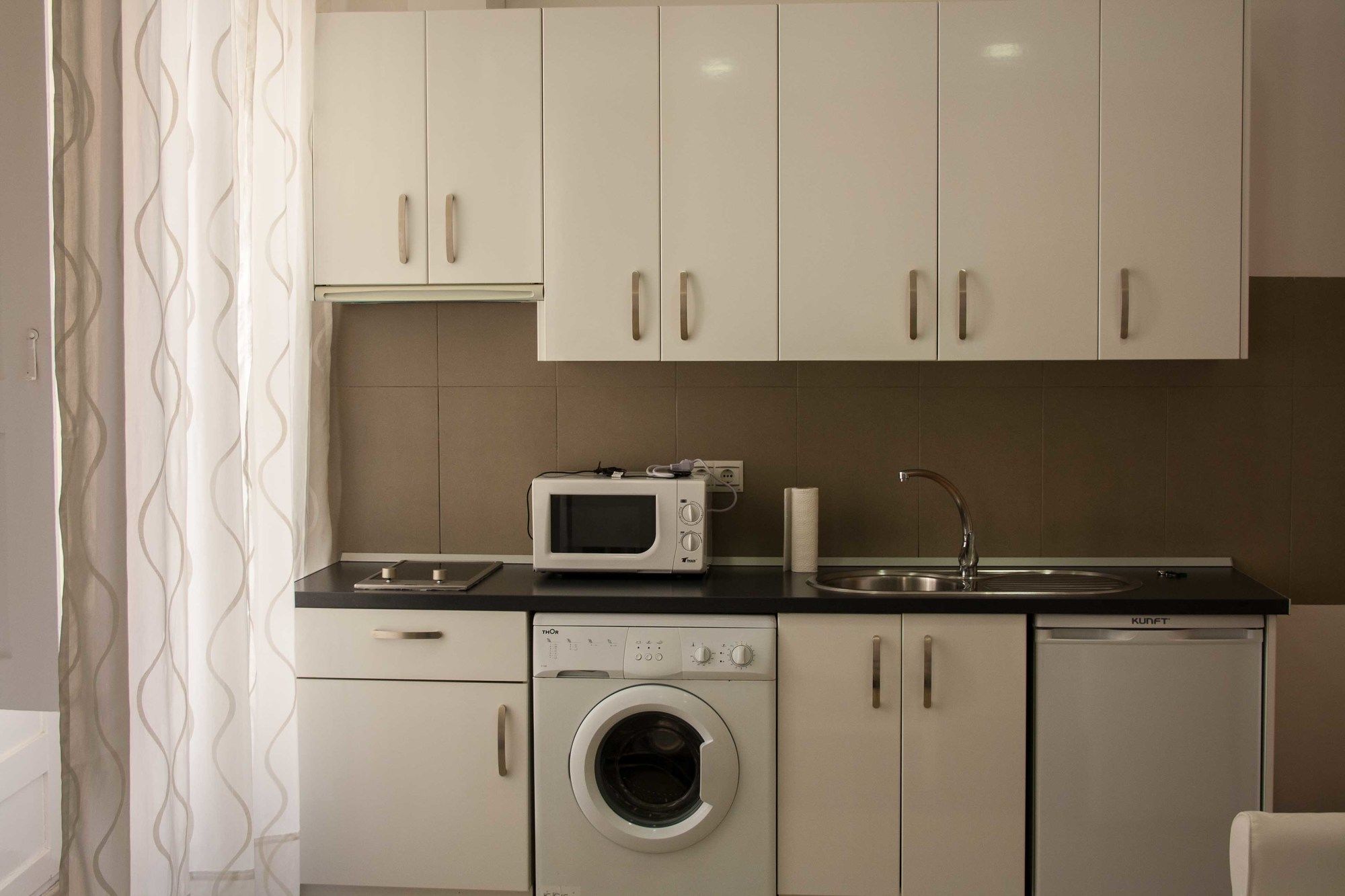 Фото Suncity Apartamentos Cobertizo