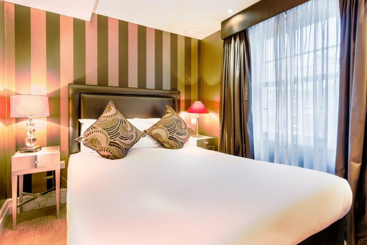 Фото Tophams Hotel