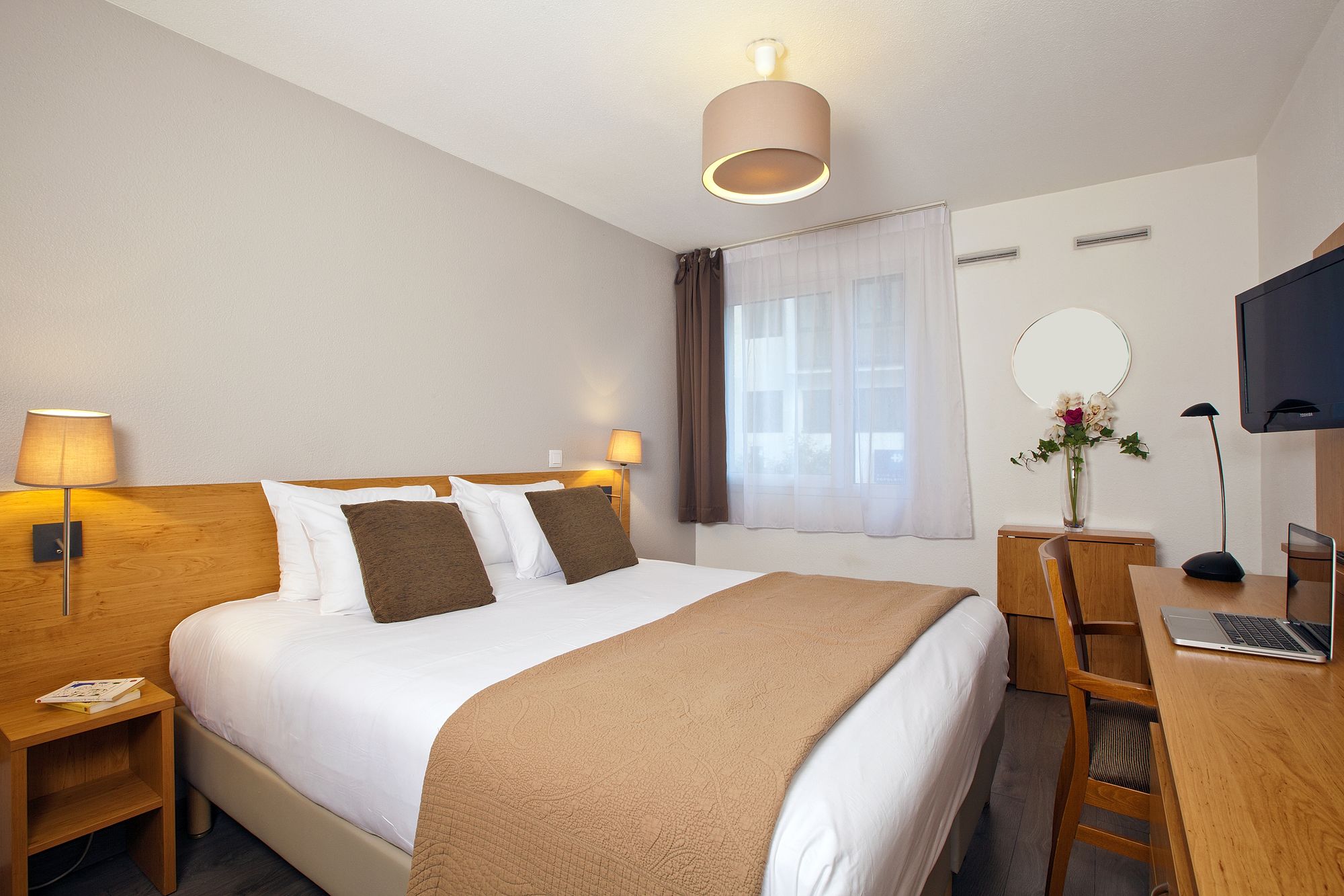 Фото Séjours & Affaires Charles de Gaulle