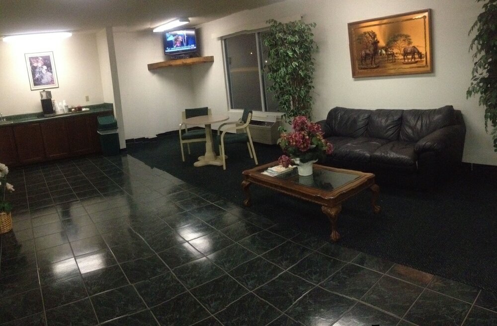 Фото Garden Inn & Suites