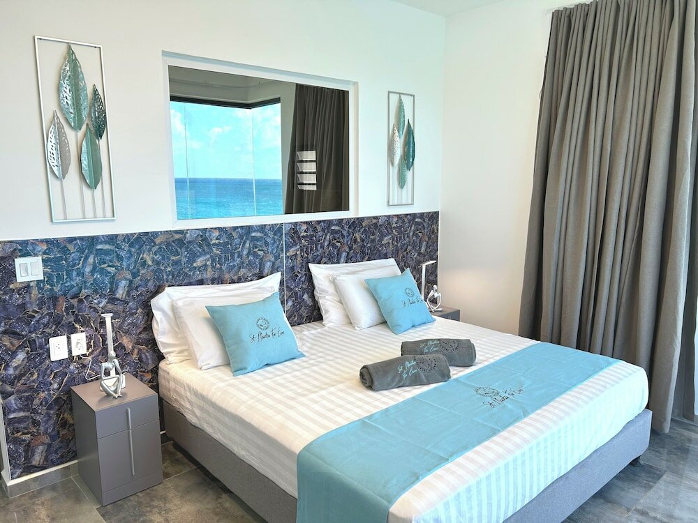 Фото Condostmaarten