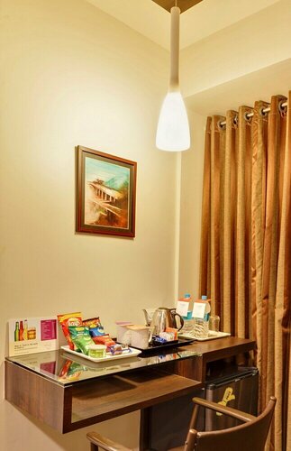 Гостиница Regenta Place Raysons Kolhapur в Колхапуре