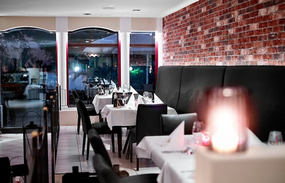 Фото Cliff Wellness Ferienwohnungen Ruegen