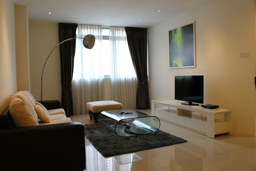 Фото Peaceful Service Suites at Taragon Puteri Bintang