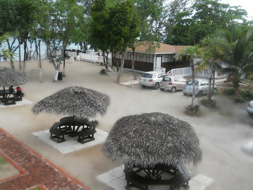 Фото Coral Harbour Beach House And Villas