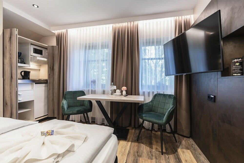 Фото Hotel Demas Unterhaching