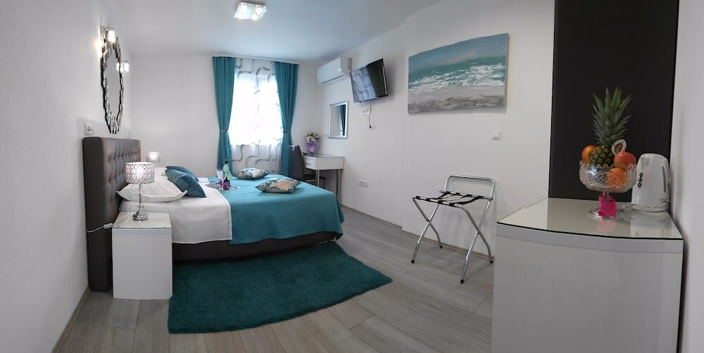 Фото Kuzma Rooms and Apartments