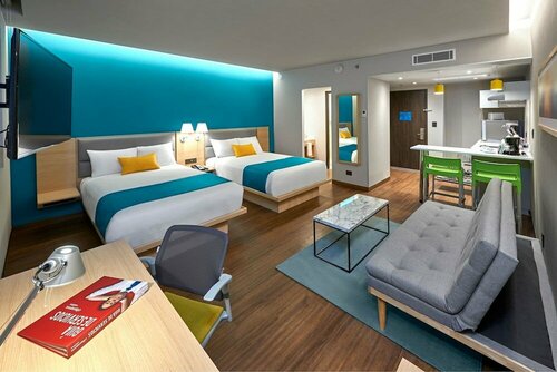 Гостиница City Express Plus by Marriott Cancún Aeropuerto Riviera