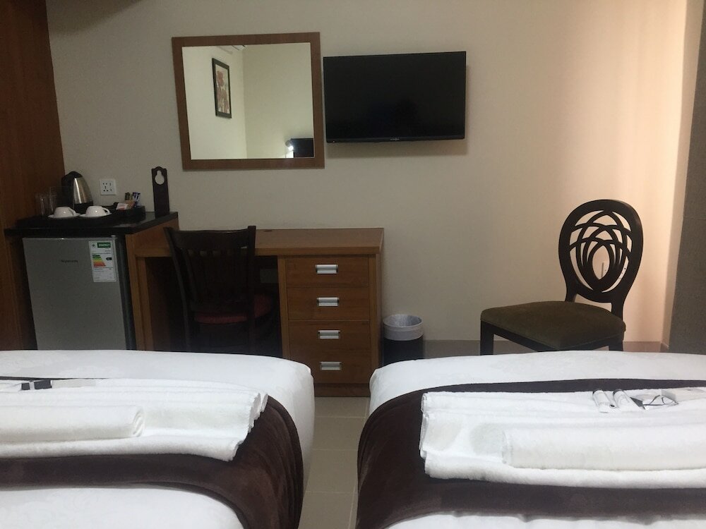 Фото Cycad Palm Hotel